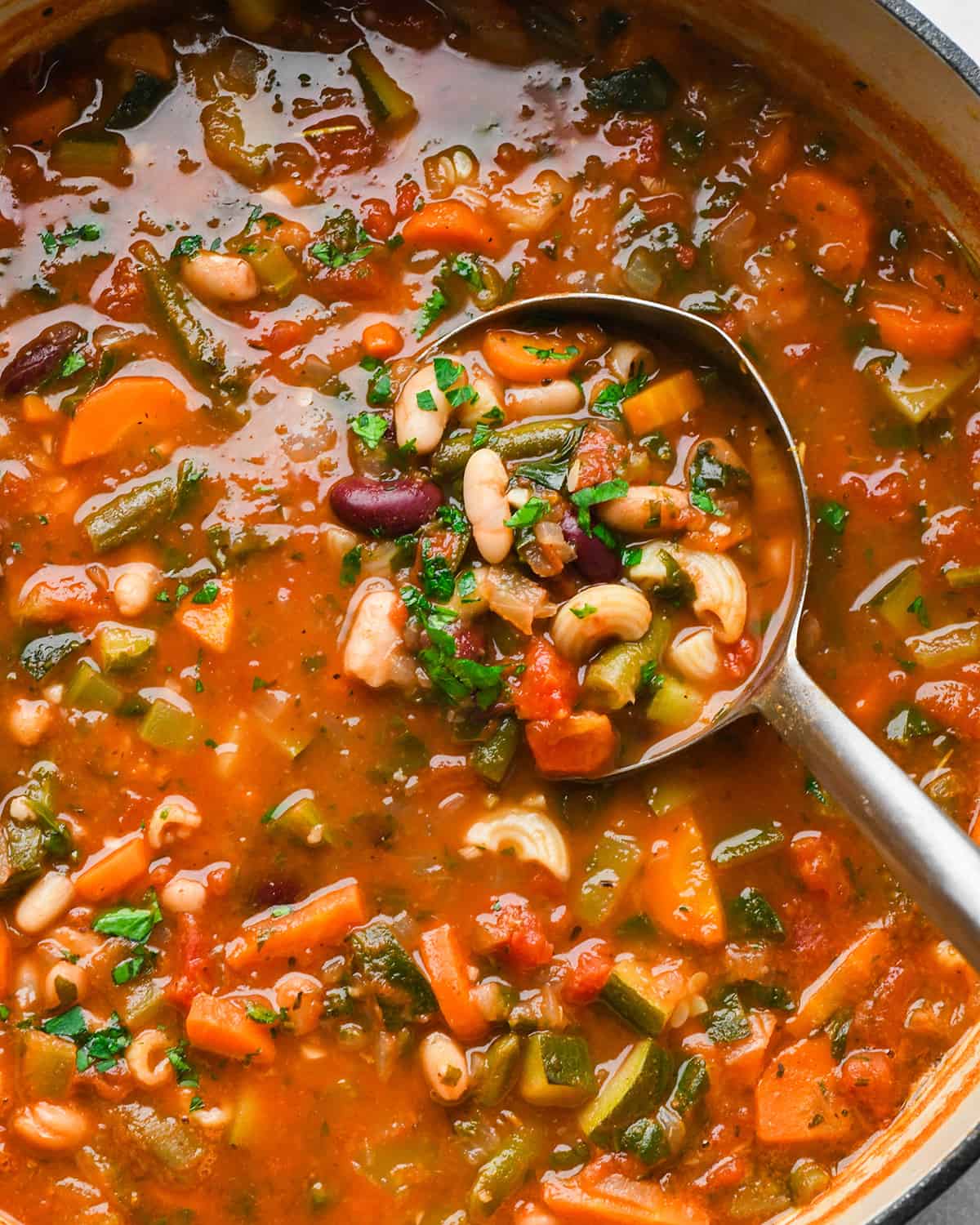 Minestrone Soup in a pot with a ladle